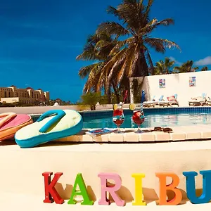 https://karibu-aruba.comcaribbean.com